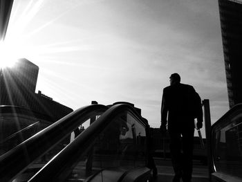 Low angle view of people in city