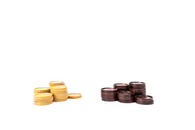 Close-up of coins on white background