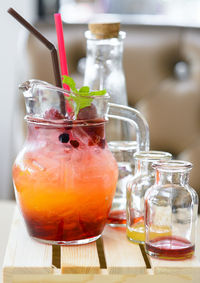 Close-up of drink in glass jar on table