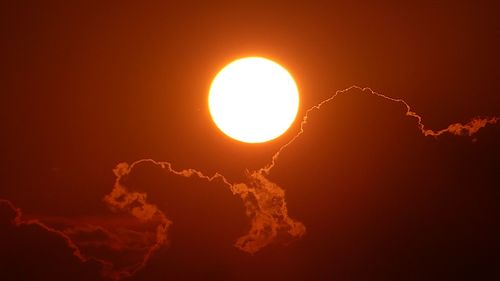 Low angle view of sun during sunset