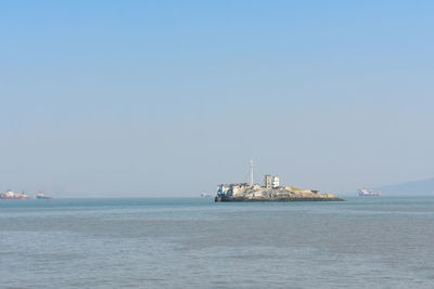 Scenic view of sea against clear sky