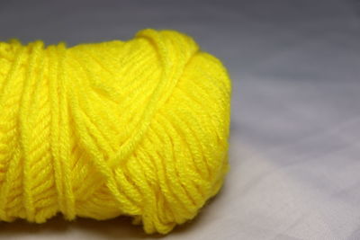 Close-up of yellow leaf on table