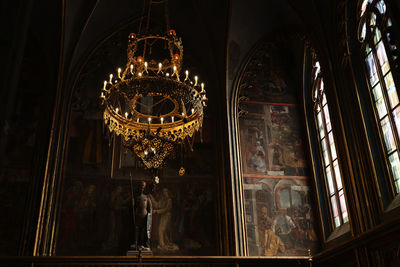 Low angle view of illuminated chandelier