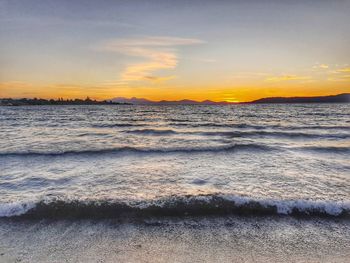 Scenic view of sea against sky during sunset