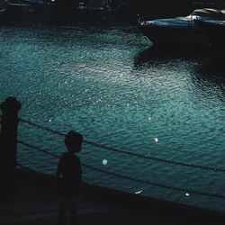 Reflection of woman in water