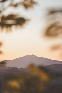 Scenic view of mountains against sky during sunset