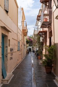 Alley amidst buildings in city