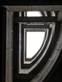 Low angle view of spiral staircase in building