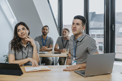 Group of people working on table