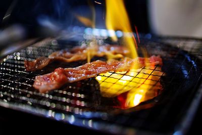 Close-up of meat on barbecue grill