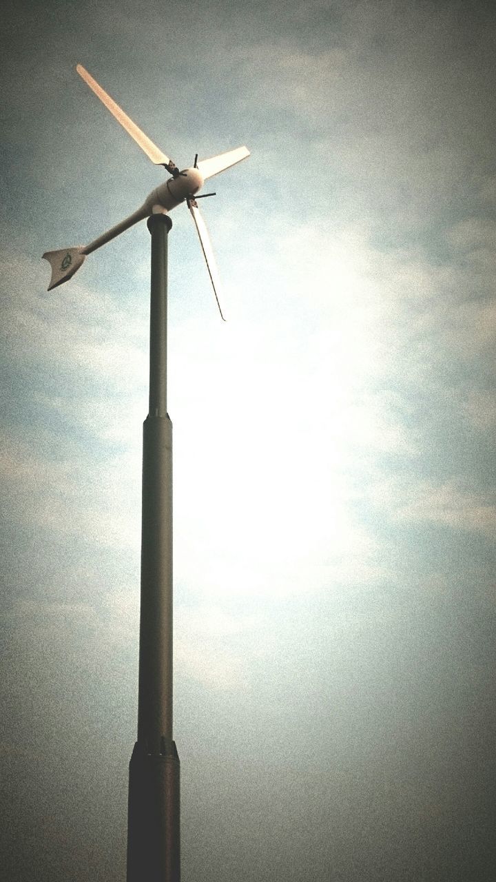 wind turbine, alternative energy, wind power, environmental conservation, renewable energy, windmill, fuel and power generation, sky, low angle view, traditional windmill, technology, nature, outdoors, no people, day, electricity, cloud - sky, tranquility, rural scene, water pump