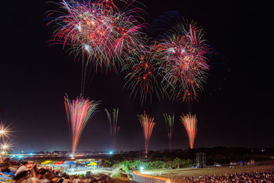 Firework display at night