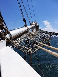 Low angle view of ship in sea against sky