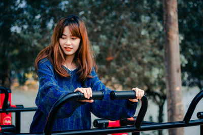 Portrait of woman sitting in car