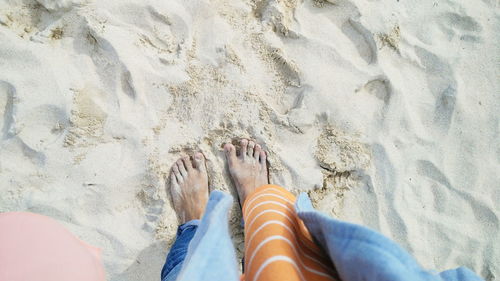 Low section of people on beach