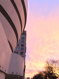 Built structure against sky at sunset