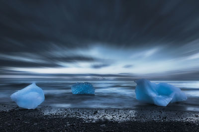 Scenic view of frozen sea against sky