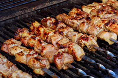 Close-up of meat on barbecue grill