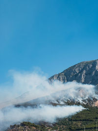 View of mountain against blue sky