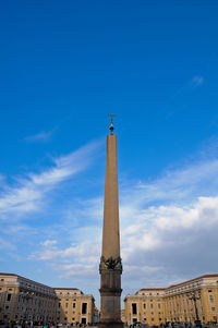 Low angle view of historical building against blue sky