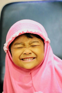 Close-up portrait of smiling girl