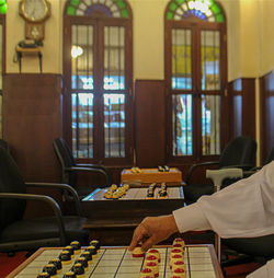 Man sitting on table in building