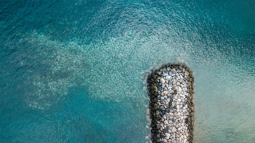 High angle view of blue sea