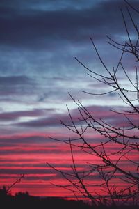 Low angle view of cloudy sky at sunset