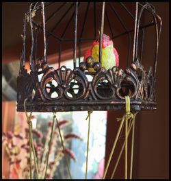 Low angle view of lantern on the wall