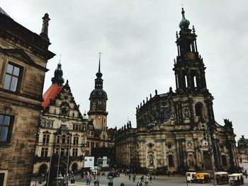 Low angle view of cathedral against cloudy sky