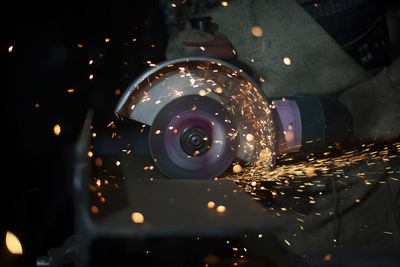 Close-up of grinder cutting metal
