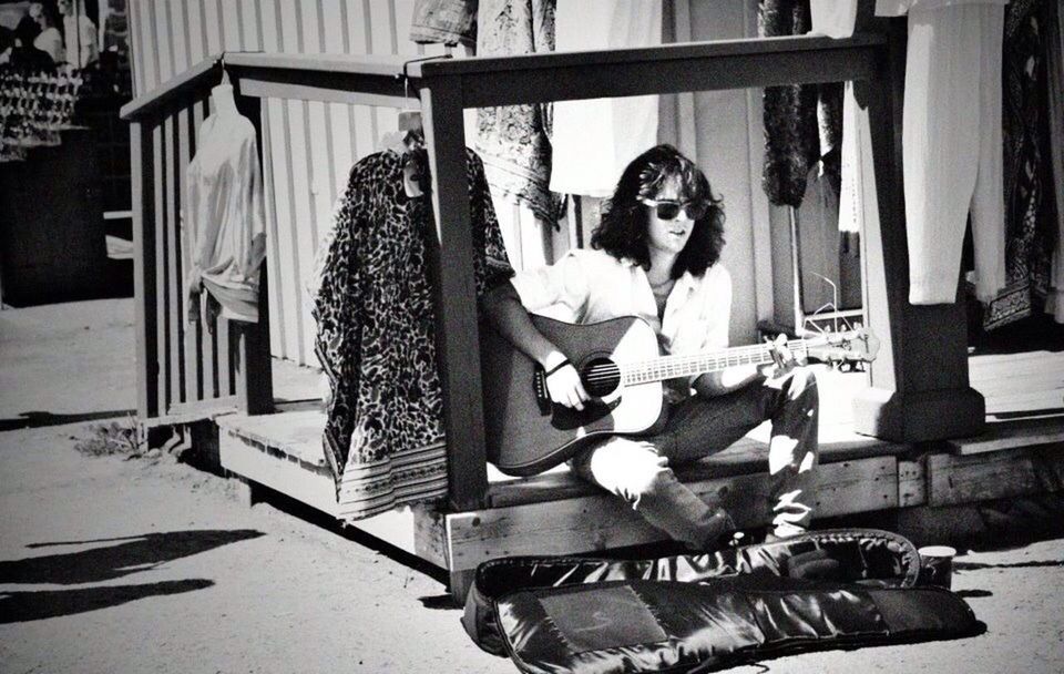 WOMAN SITTING ON CHAIR