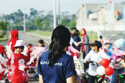 Rear view of woman at indonesia independence day celebration