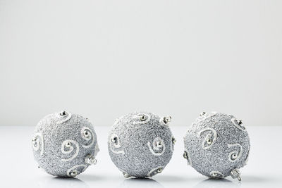 Close-up of fruits against white background