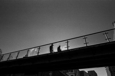 Low angle view of bridge against clear sky