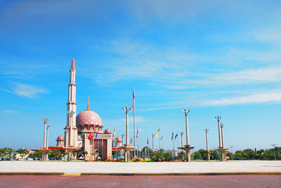 View of temple building against blue sky