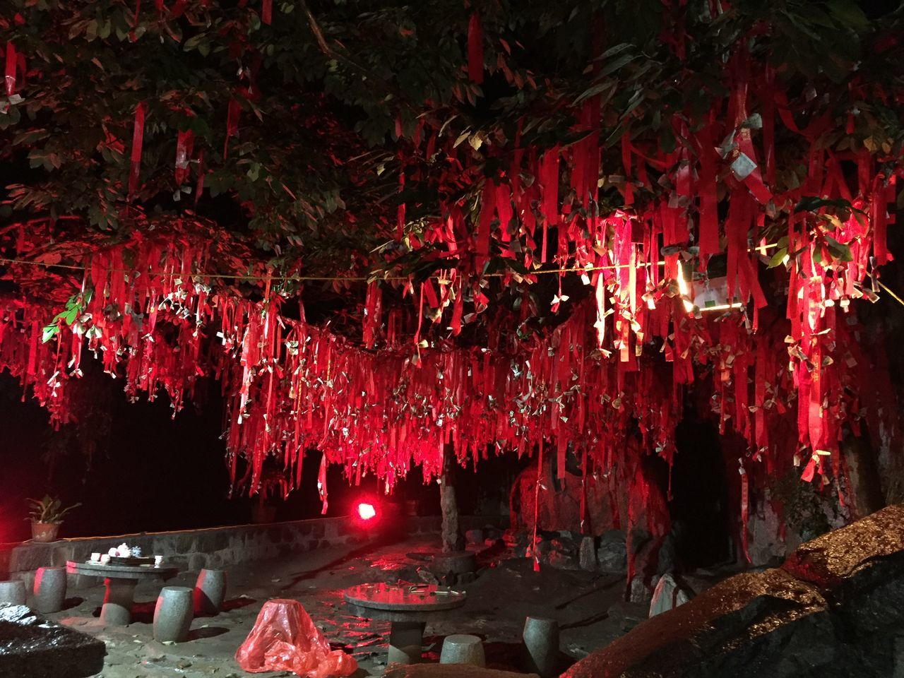 red, night, illuminated, hanging, built structure, abundance, building exterior, celebration, tradition, cultures, outdoors, market, architecture, religion, decoration, no people, market stall, pink color, freshness, flower
