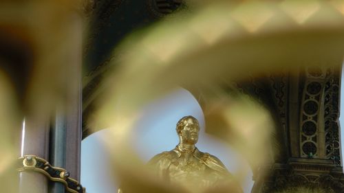 View of statue against temple