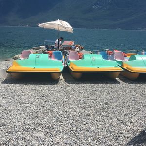 Boats moored on beach