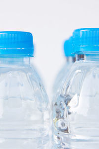 Close-up of empty blue bottles