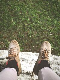 Low section of person standing on land