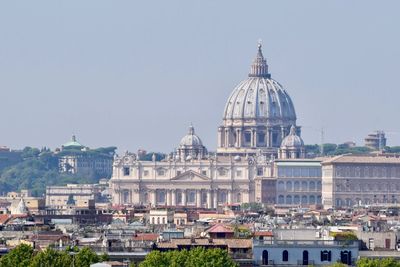 View of cathedral in city against clear sky