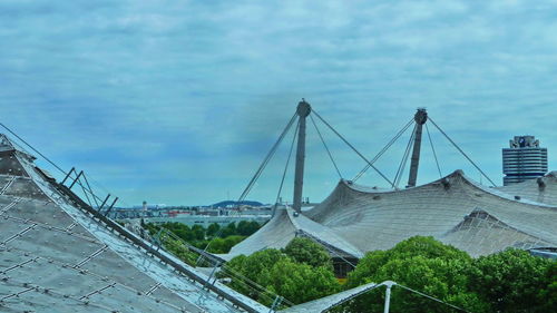 View of suspension bridge against cloudy sky