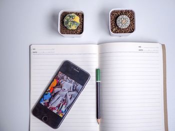 High angle view of mobile phone on table
