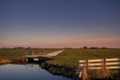 Scenic view of landscape against sky during sunset