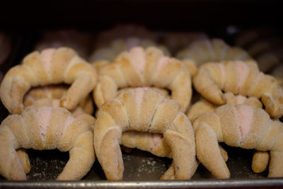 Close-up of croissant for sale in bakery