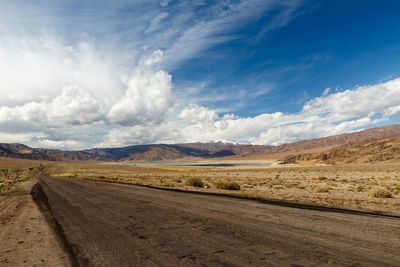 Dirt road passing through a desert