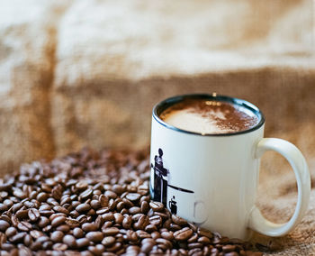 Close-up of coffee cup on table