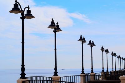 Low angle view of street light against sky