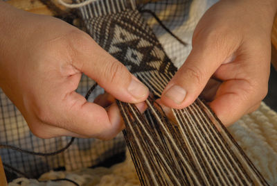 Close-up of man holding hands